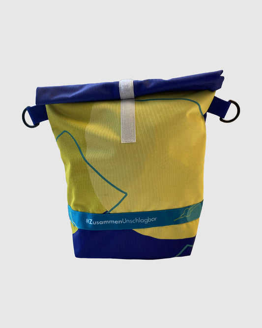 Upcycled roll top bag in large from Special Olympics 2023