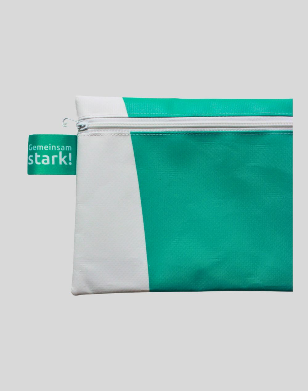 Upcycled A5 pouch made from 2024 Winter Games banner material