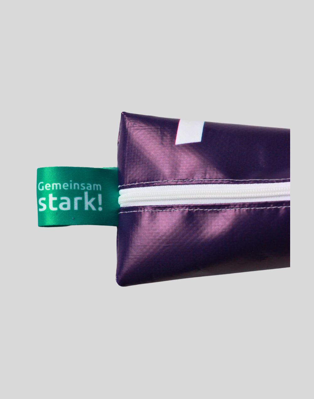 Pencil case made from recycled 2024 Winter Games banner material