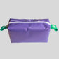Cosmetic bag made from recycled 2024 Winter Games banner material