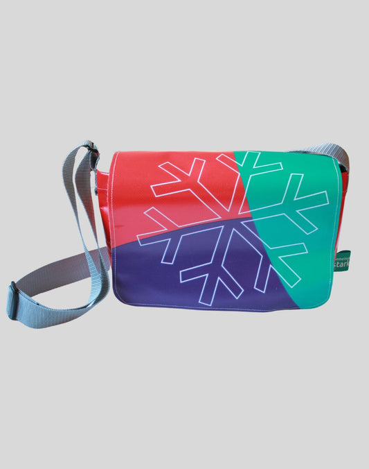 Cross-body bag made from recycled 2024 Winter Games banner material