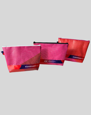 Upgecycelte A5 Waschtasche aus Bannerplane der Nationale Spiele Saarland 2026