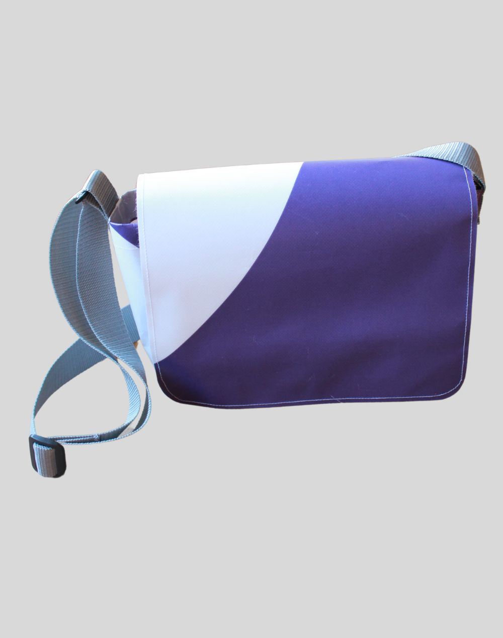 Cross-body bag made from recycled 2024 Winter Games banner material