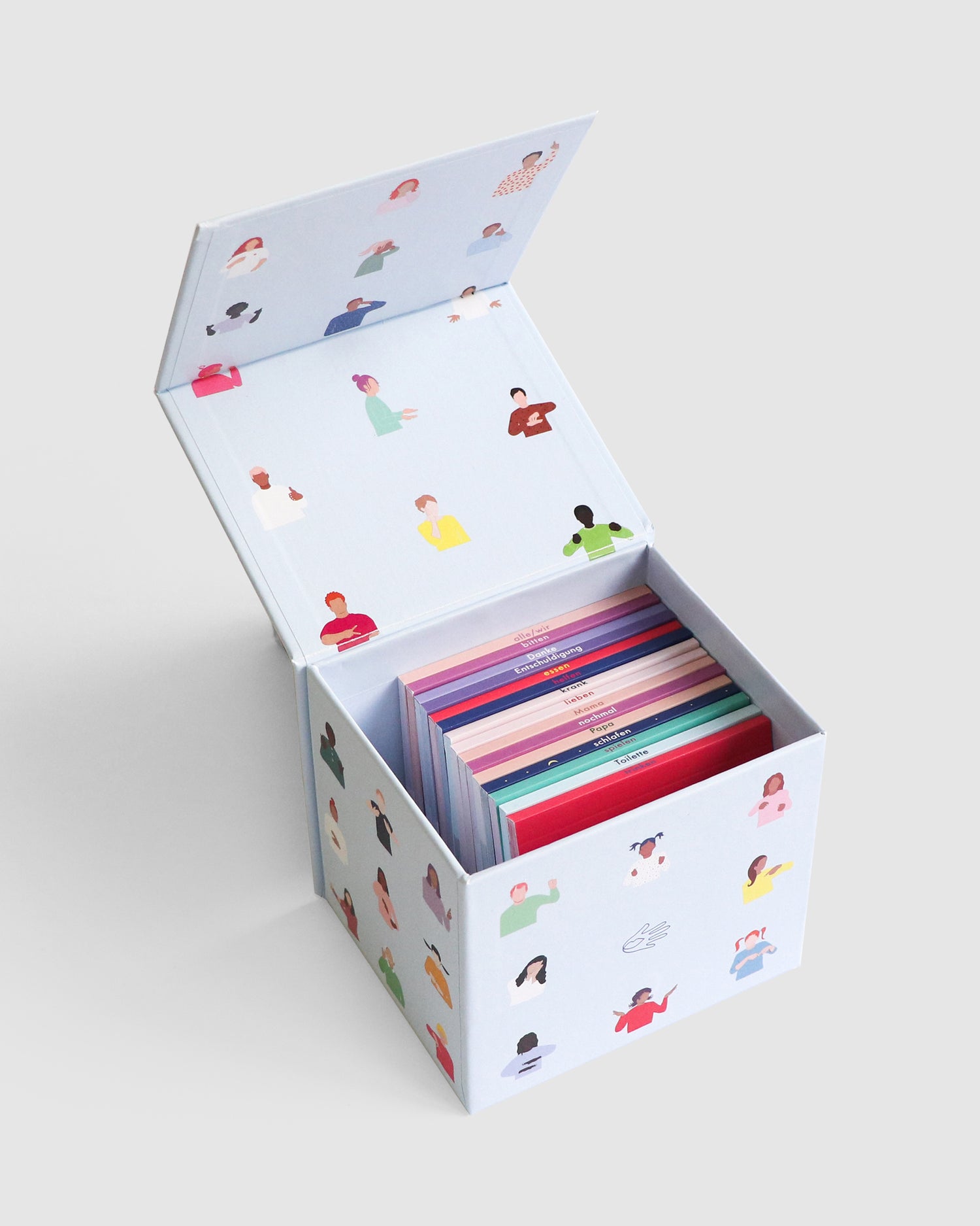 Geöffnete Box mit a Talking Hands Daumenkino Bllenüchern