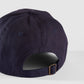 Cap Navy von hinten, verstellbar durch Schnalle