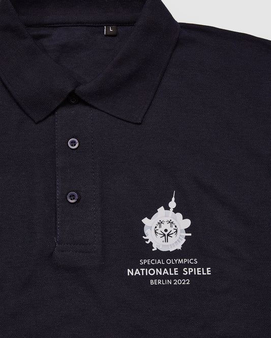 Nahaufnahme Polo-Shirt vom Nationale Spiele Logo 
